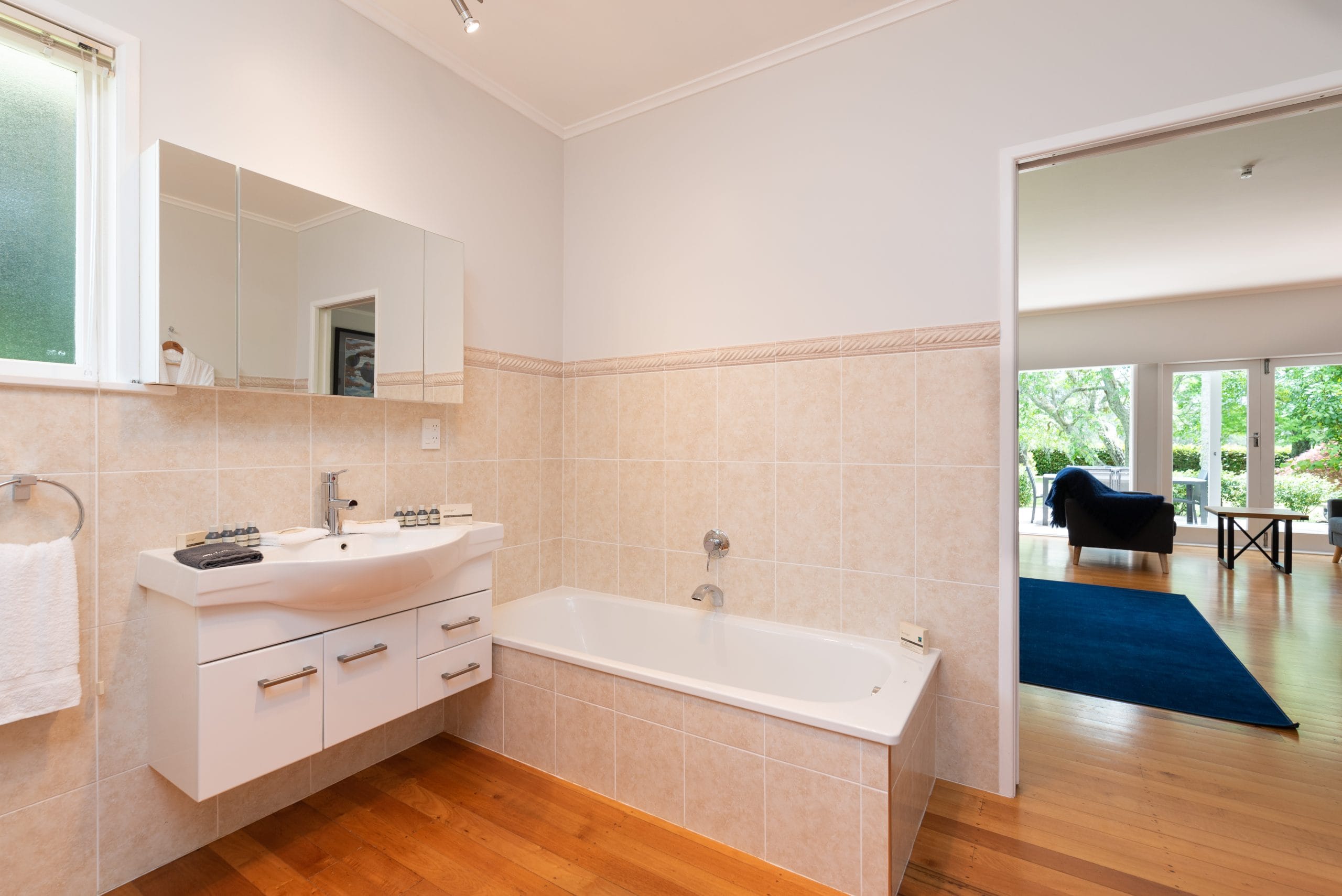 Full size bath tub in the Takahē suite's large ensuite bathroom.